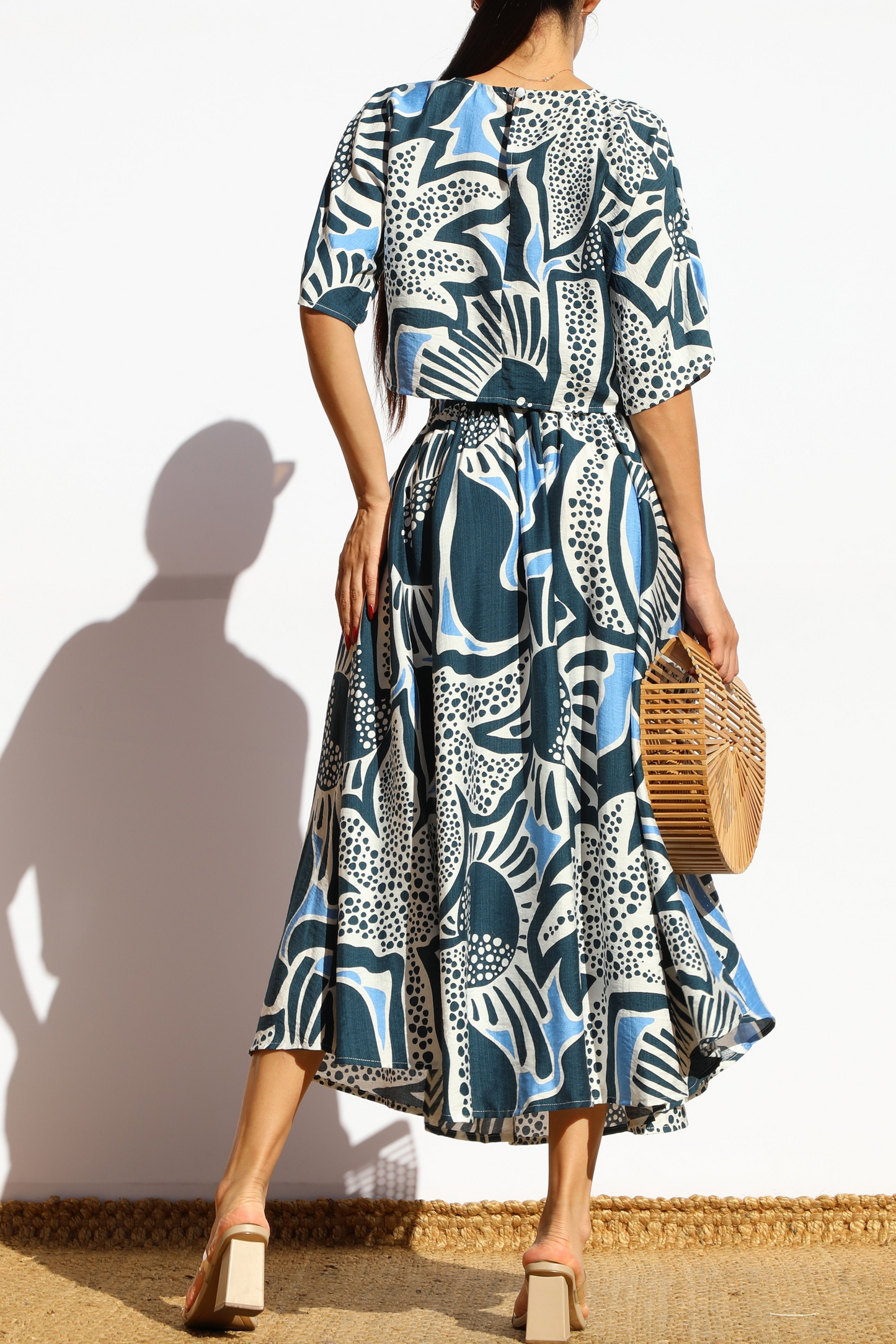 Printed Loose Fit Top And Flared Midi Skirt Set